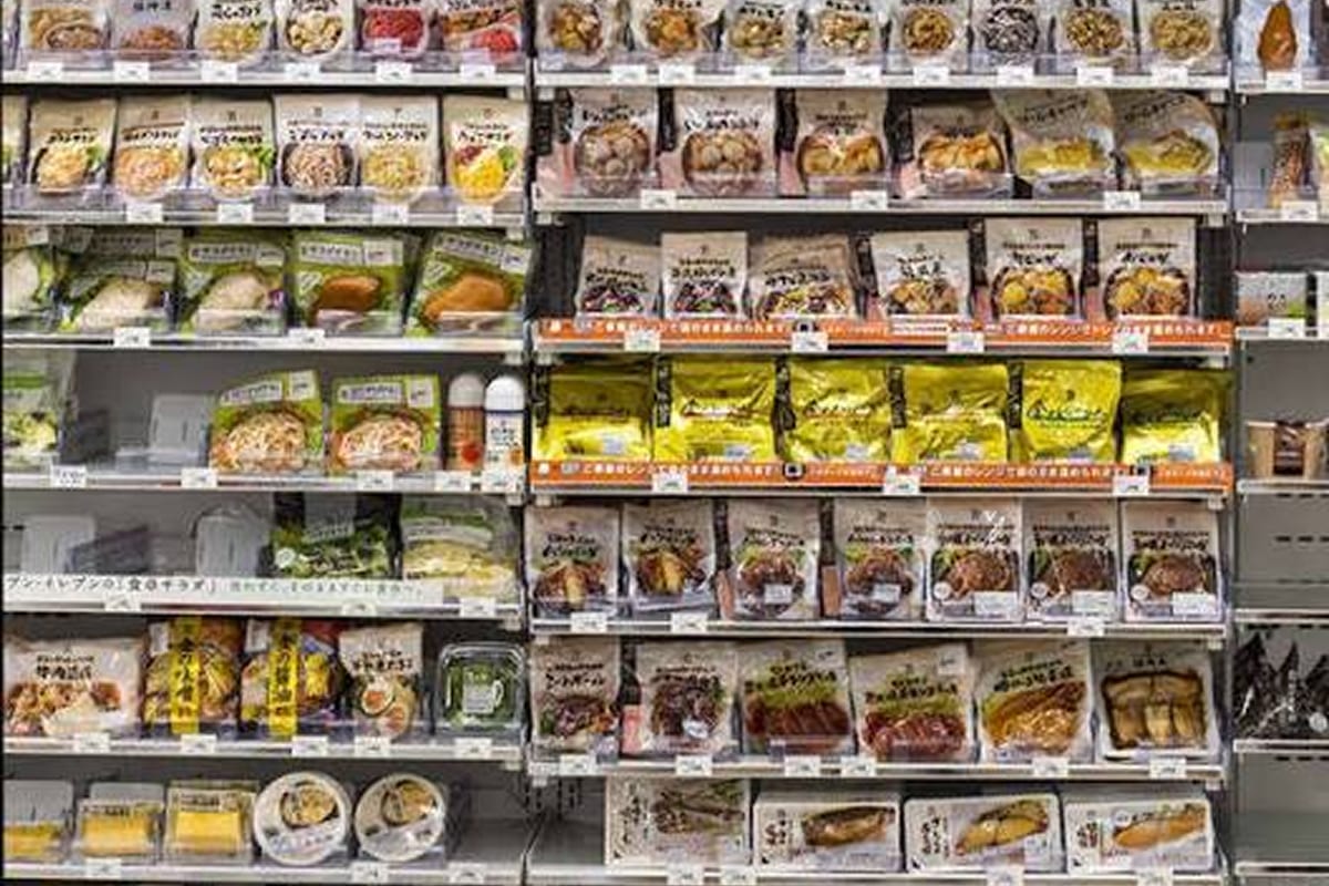 Shelves of packaged side dishes at a Japanese 7-Eleven