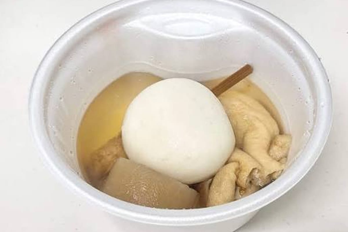 A bowl of oden with daikon, egg, and fish-cake ingredients