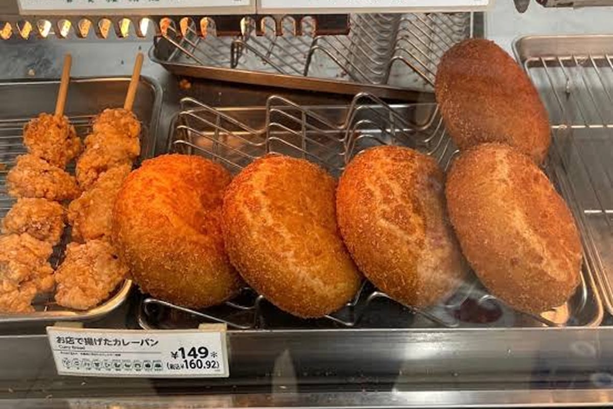 Curry bread displayed in a hot-snack case at a Japanese 7-Eleven