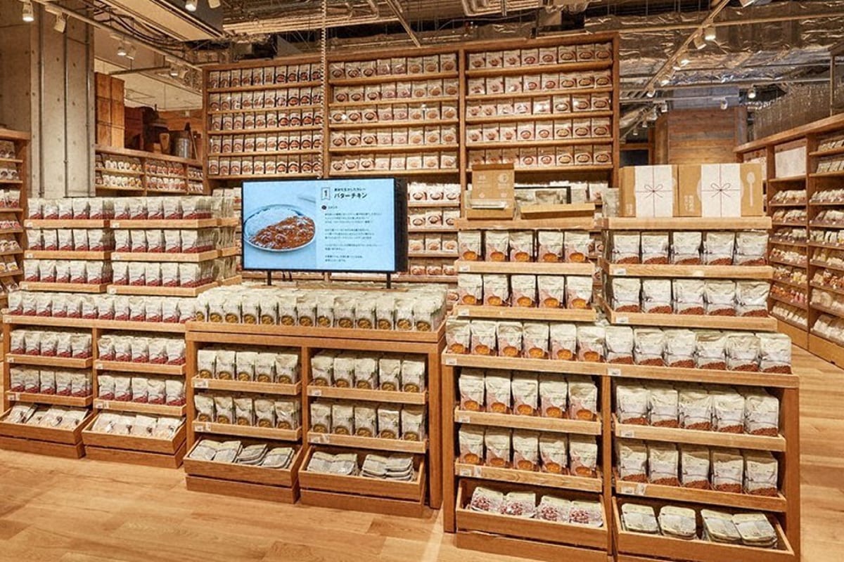 Shelves in a MUJI store filled with retort curry pouches